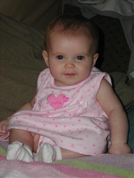 Molly sitting up all by herself ... almost