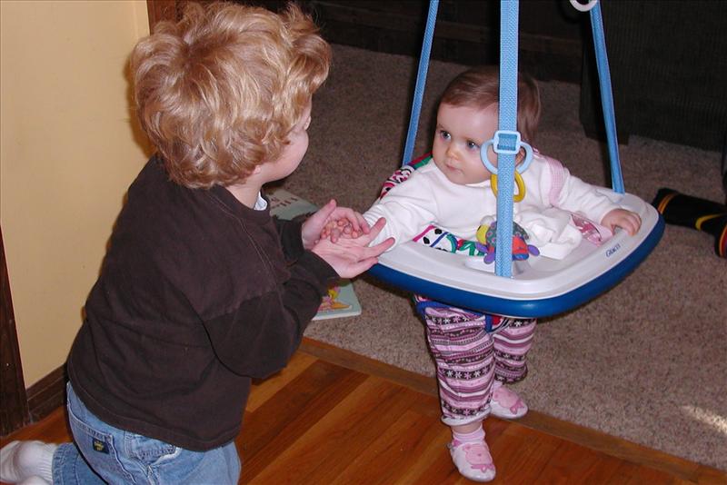 Callan teaching Molly to use the jumper