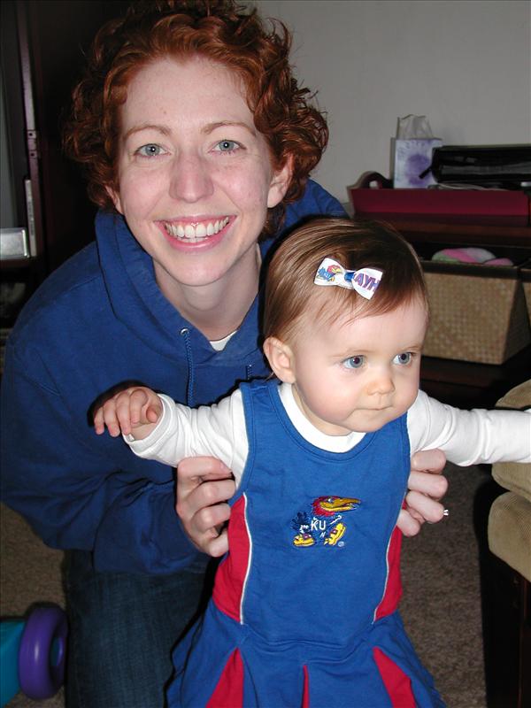 Molly and Mommy cheering for KU