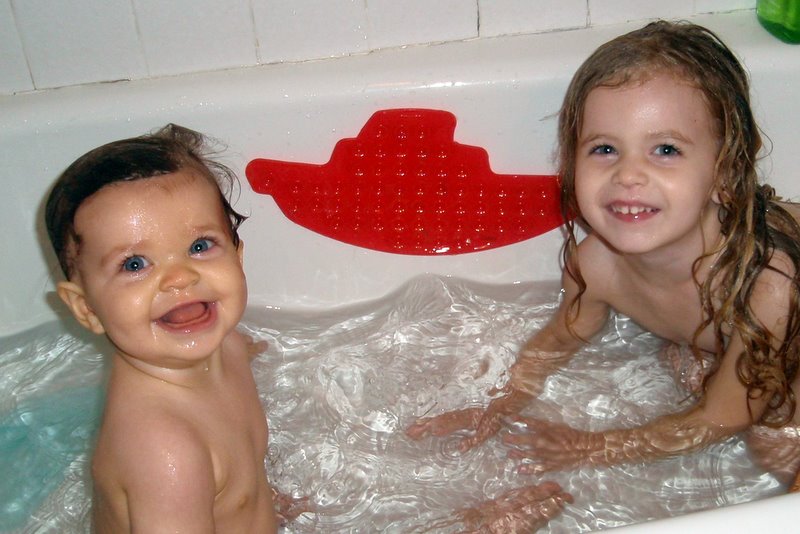 Charlotte's first time in the big bath! Molly was a lot of help!