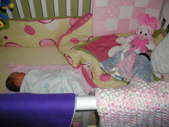 First time in her crib, good thing she doesn't take up much space.